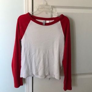 Red and white baseball long sleeve shirt.